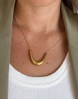 Gold Arc Halskette